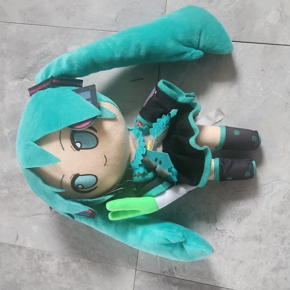 Miku, stuffed doll, excellent condition, measures 11 in